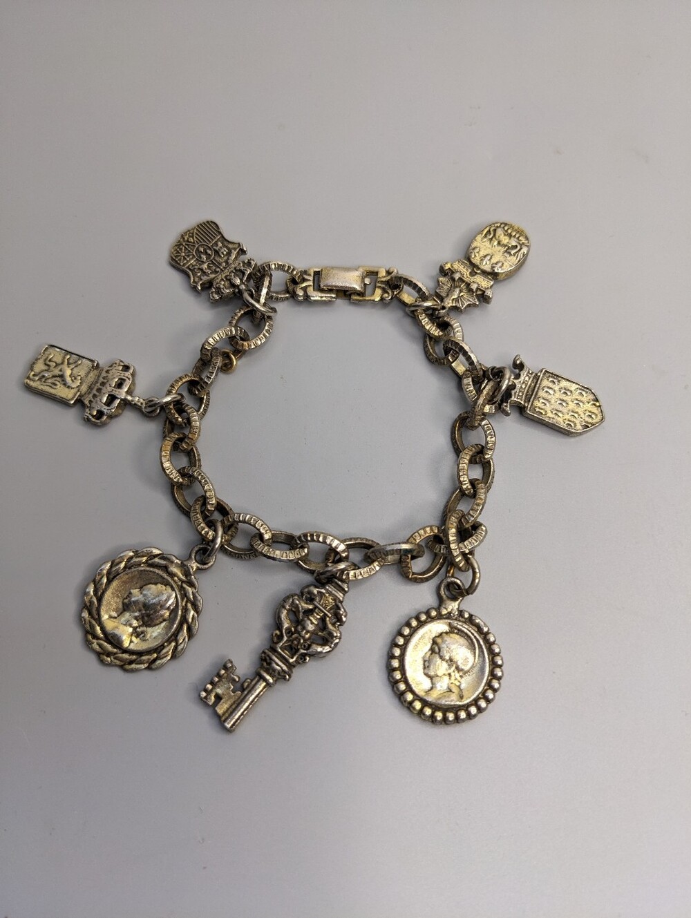 Vintage Souvenir Charm Bracelet With Mixed Metal Medallions And Crest Charms 7"